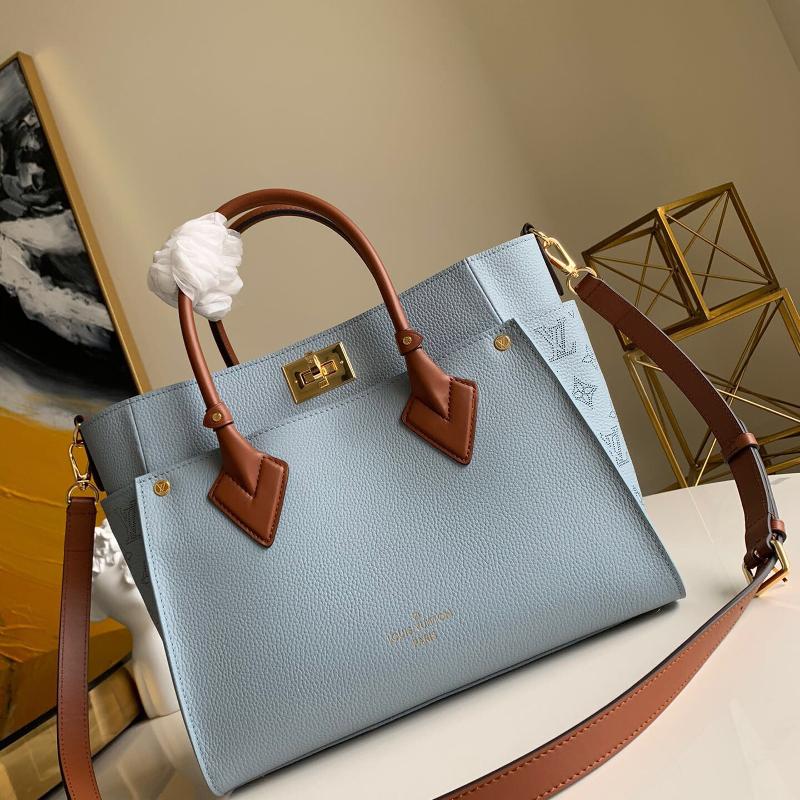LV Handbags Tote Bags M56078 Full leather side perforated light blue with caramel